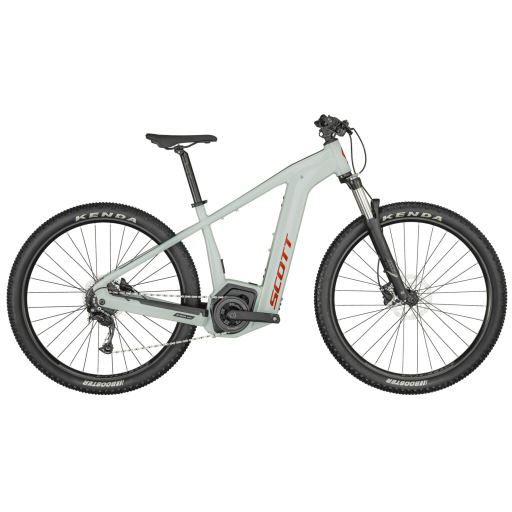 Vuoden 2024 vihreänharmaa Scott Aspect eRide 940 sähkömaastopyörä sivusta kuvattuna